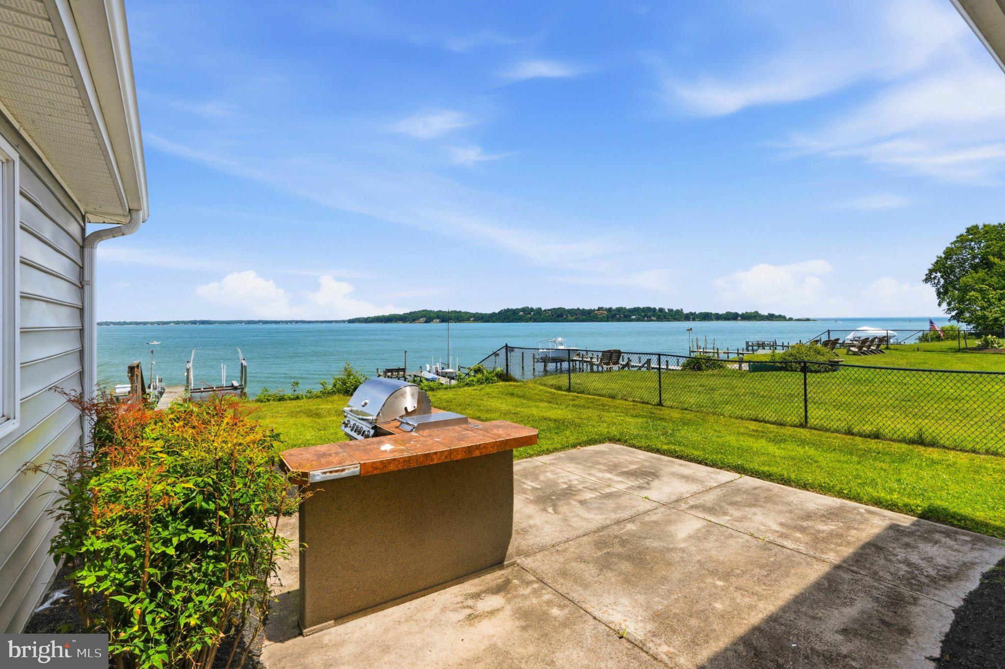 1100 River Bay Road Annapolis, MD 21409 - Photo 41 of 67 a view of a swimming pool and an outdoor seating