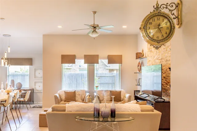 a large kitchen with a table and chairs