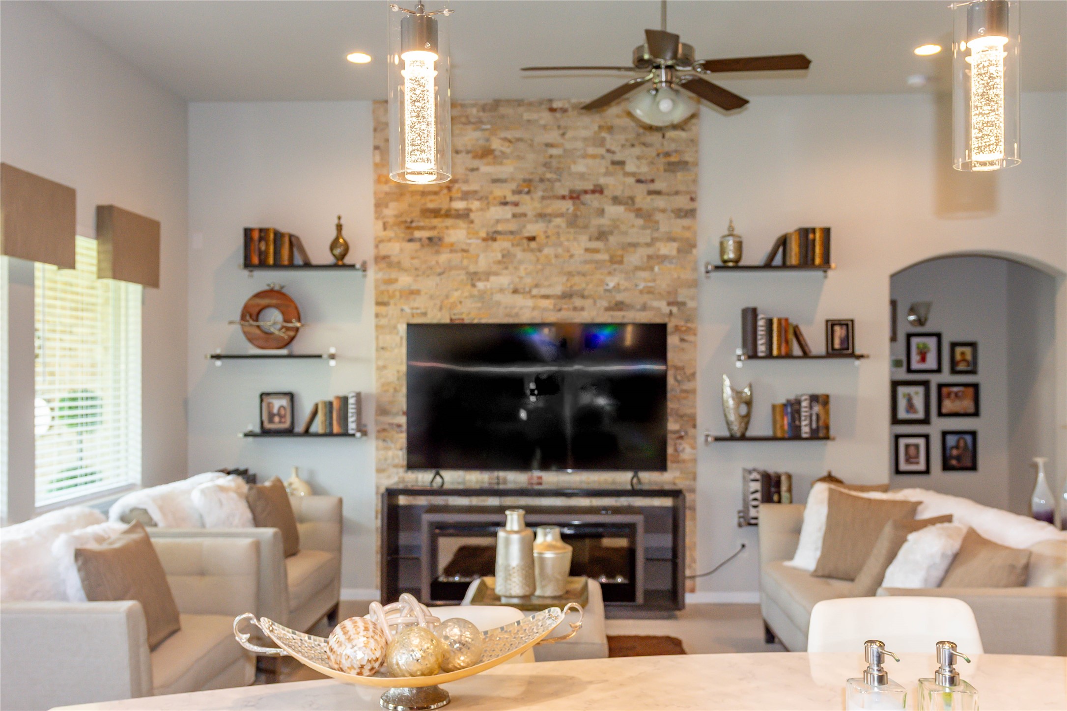 4306 Sandhill Terrace Lane Katy, TX 77493 - Photo 21 of 45 a living room with furniture and a fireplace