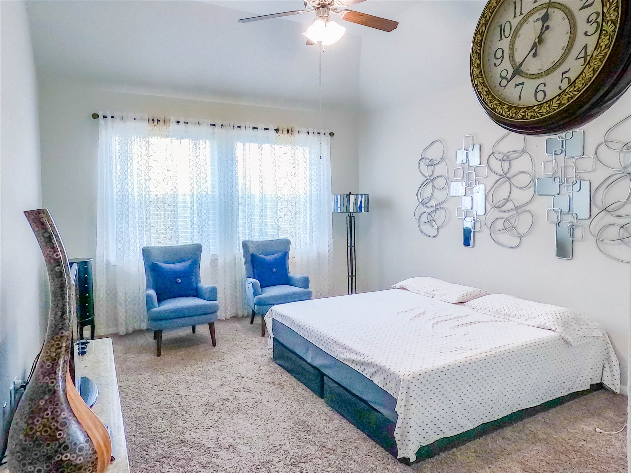 4306 Sandhill Terrace Lane Katy, TX 77493 - Photo 26 of 45 a bedroom with a bed and a chair in it