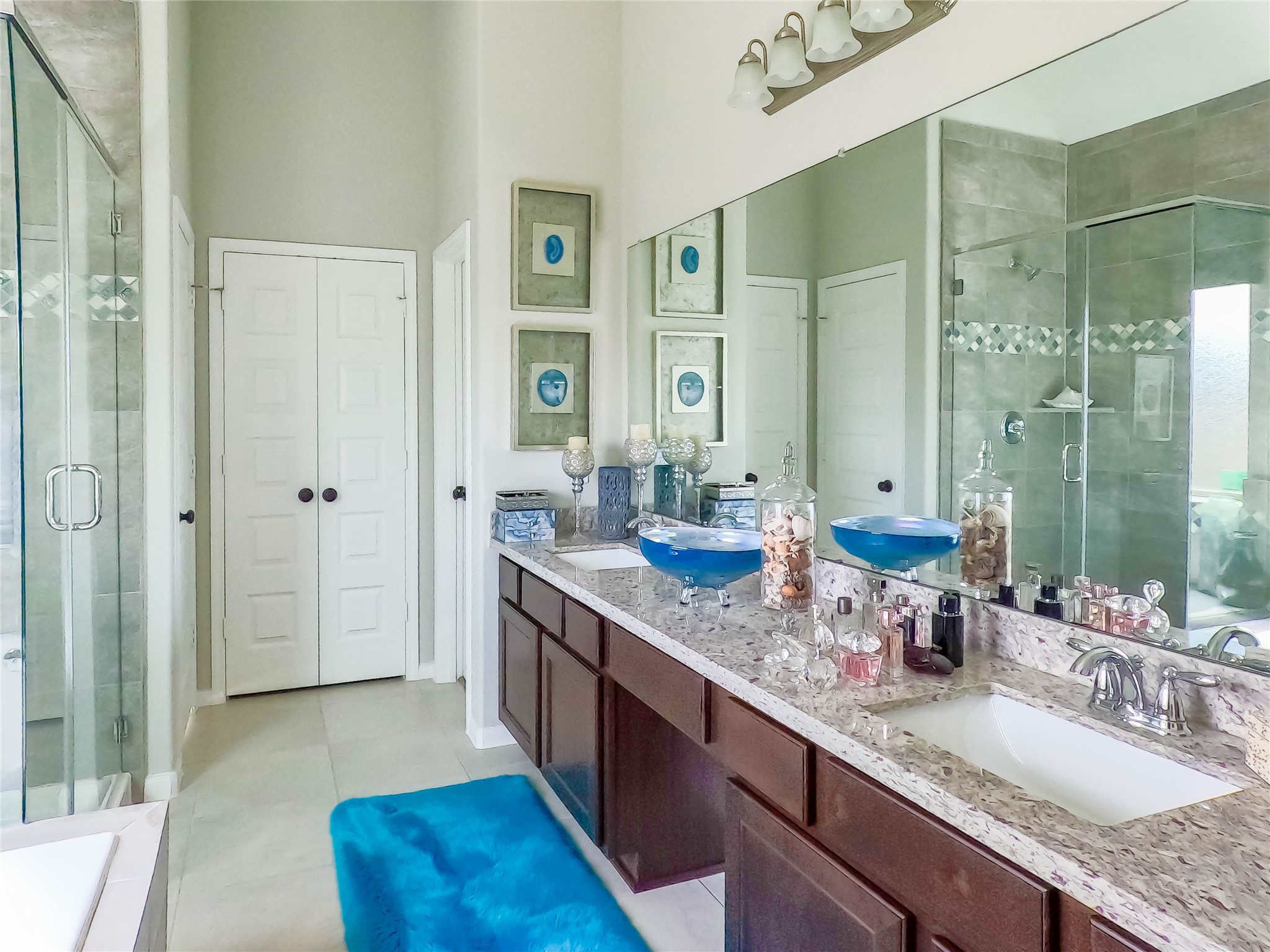 4306 Sandhill Terrace Lane Katy, TX 77493 - Photo 27 of 45 a bathroom with double vanity sinks and a shower
