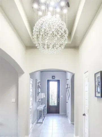 a bathroom with a granite countertop sink mirror and vanity
