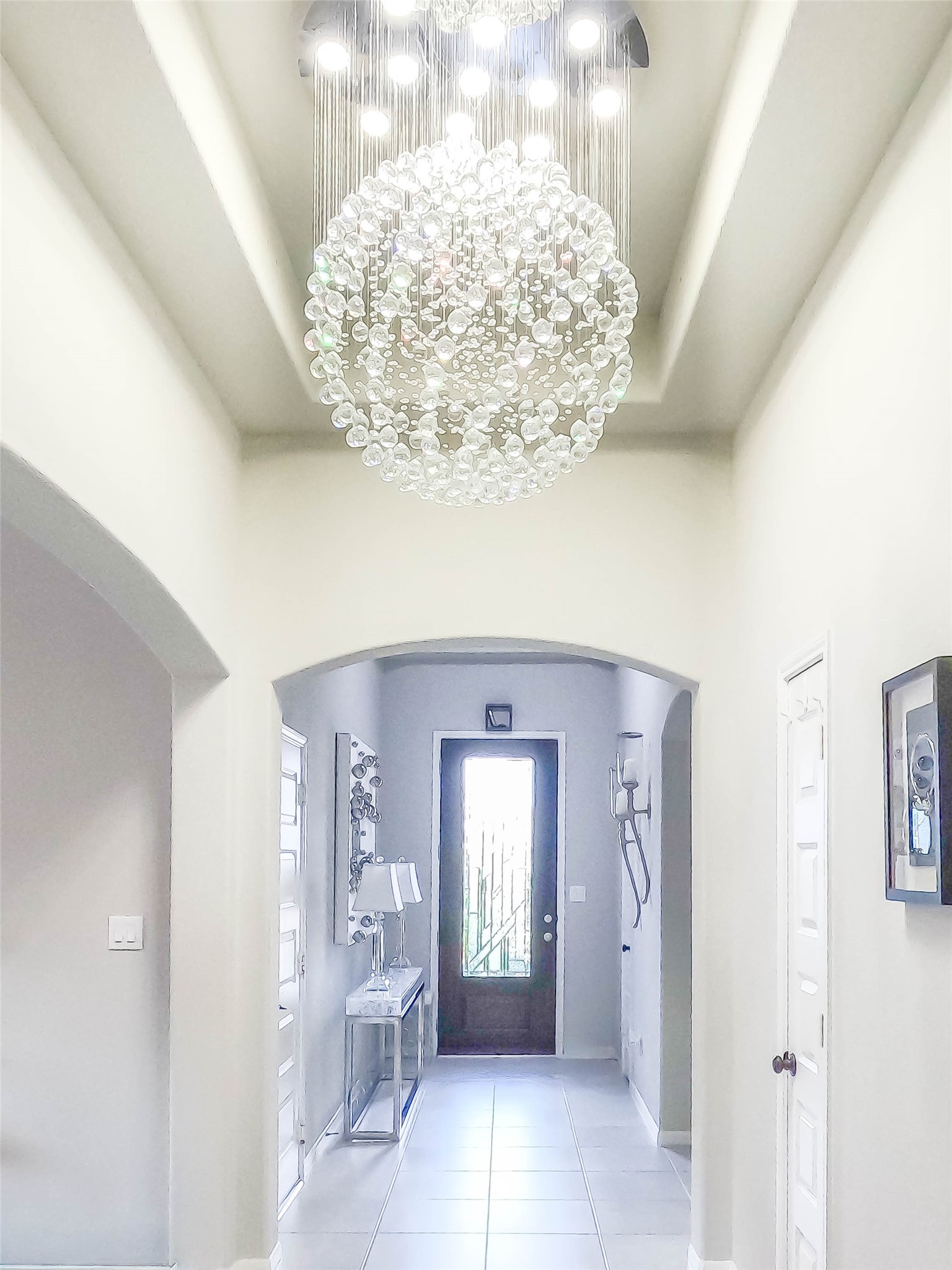 4306 Sandhill Terrace Lane Katy, TX 77493 - Photo 32 of 45 a view of a chandelier in a room