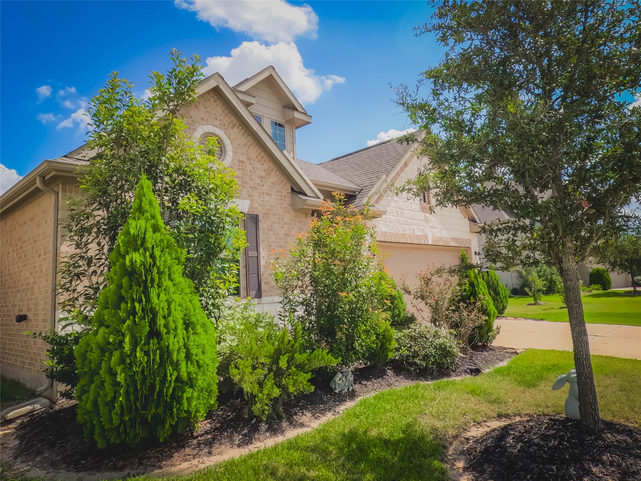 4306 Sandhill Terrace Lane Katy, TX 77493 - Photo 39 of 45 a front view of a house with garden
