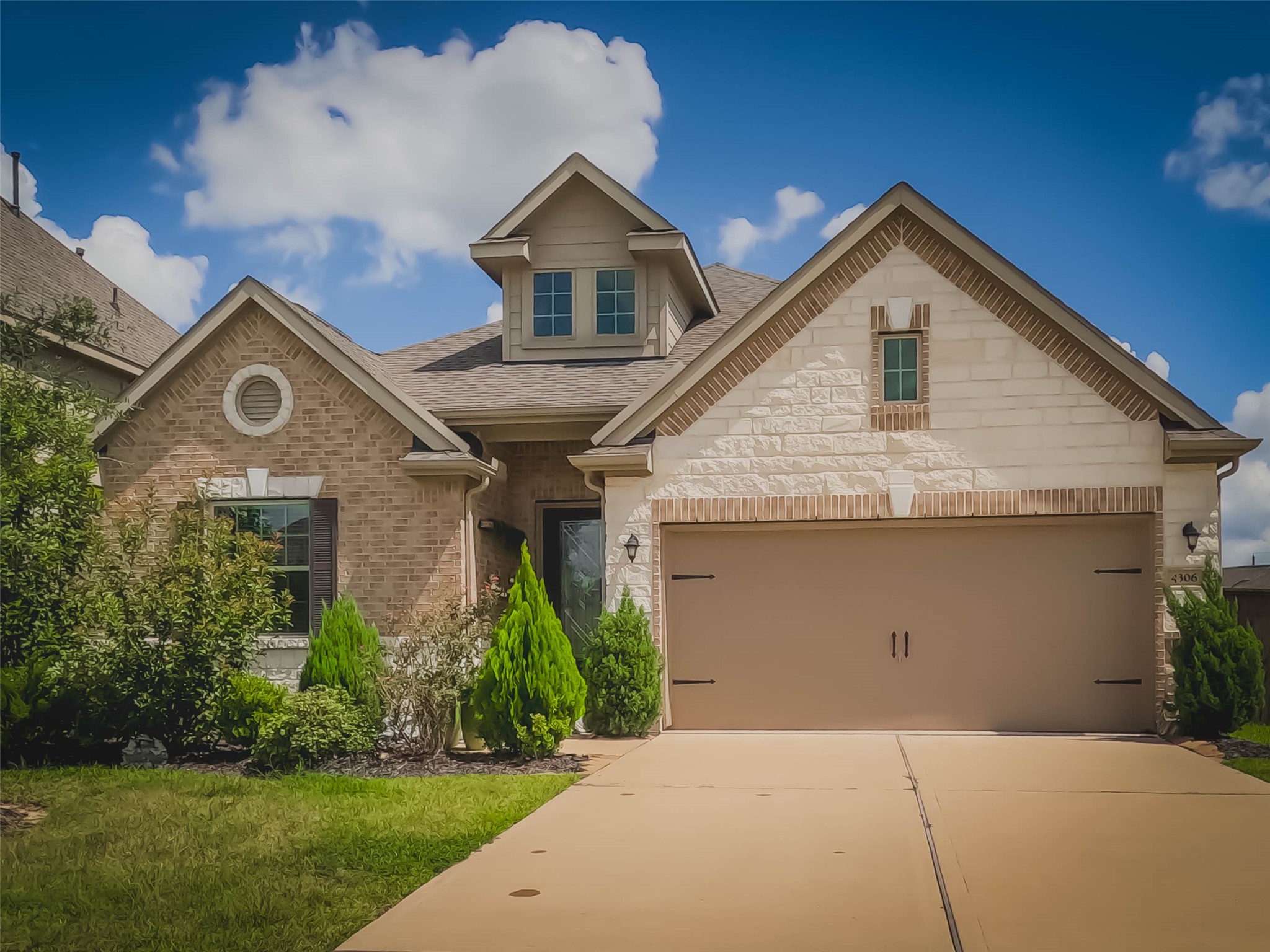 4306 Sandhill Terrace Lane Katy, TX 77493 - Photo 40 of 45 a front view of a house with a yard