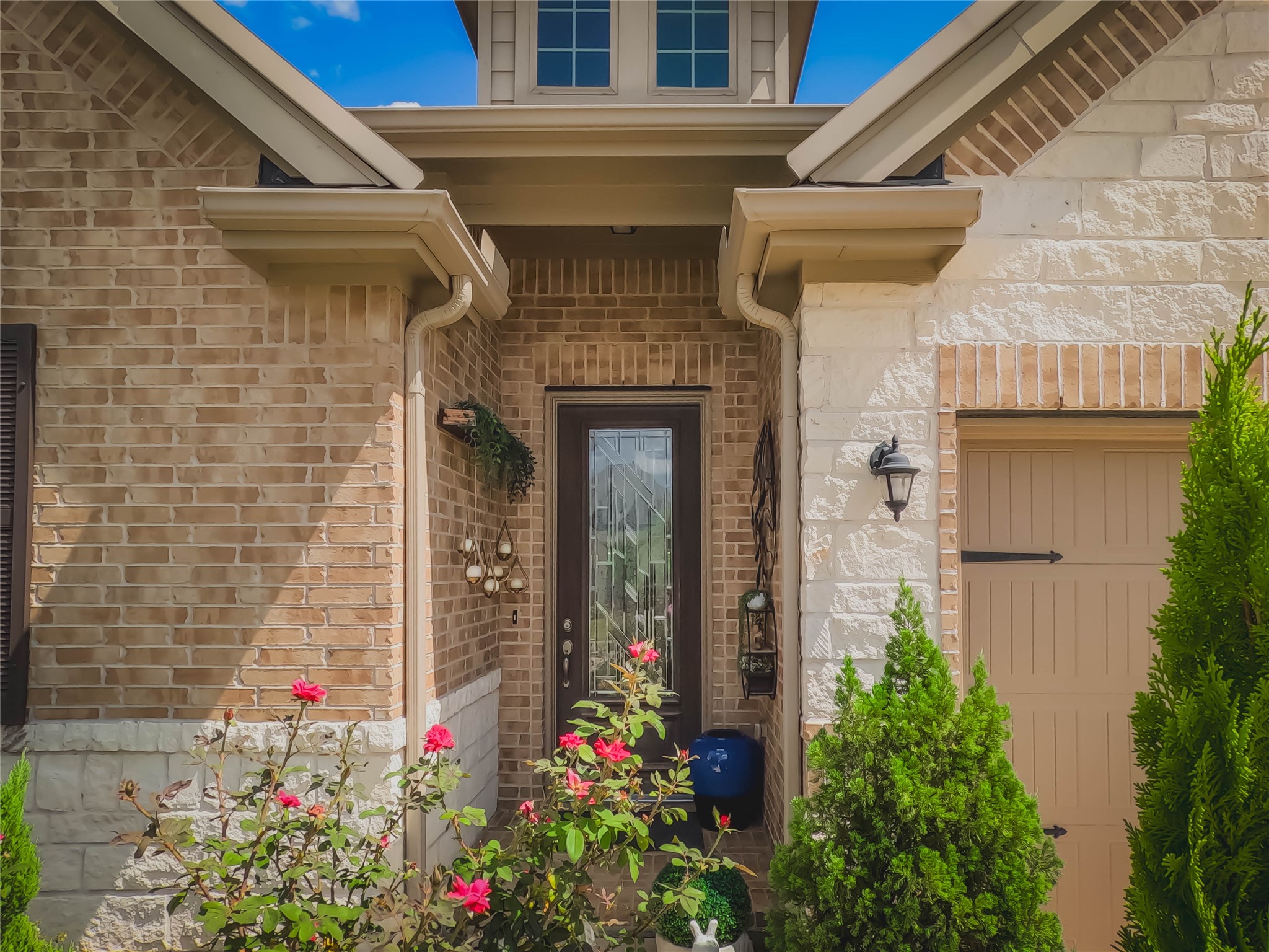 4306 Sandhill Terrace Lane Katy, TX 77493 - Photo 42 of 45 a front view of a house with flowers