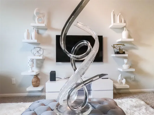 a bathroom with a toilet and a mirror