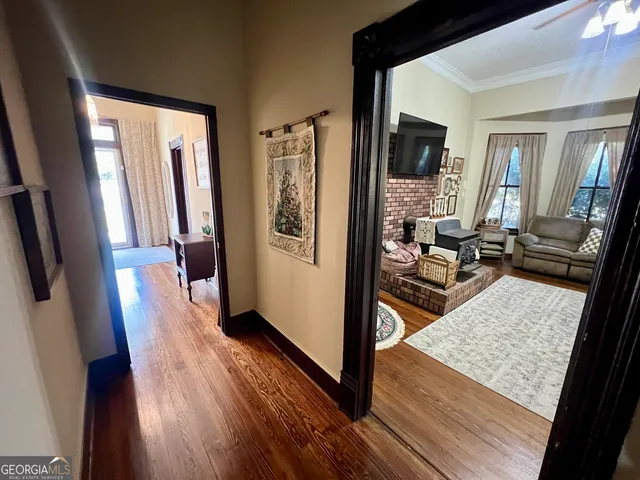 a view of a living room and dining room
