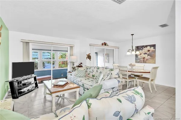 a view of a dining room with furniture