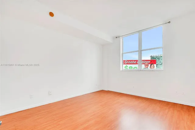 a view of a room with a fan