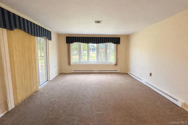 $3,200 | 9 Guilford Court, Unit B, Ridge, NY 11961