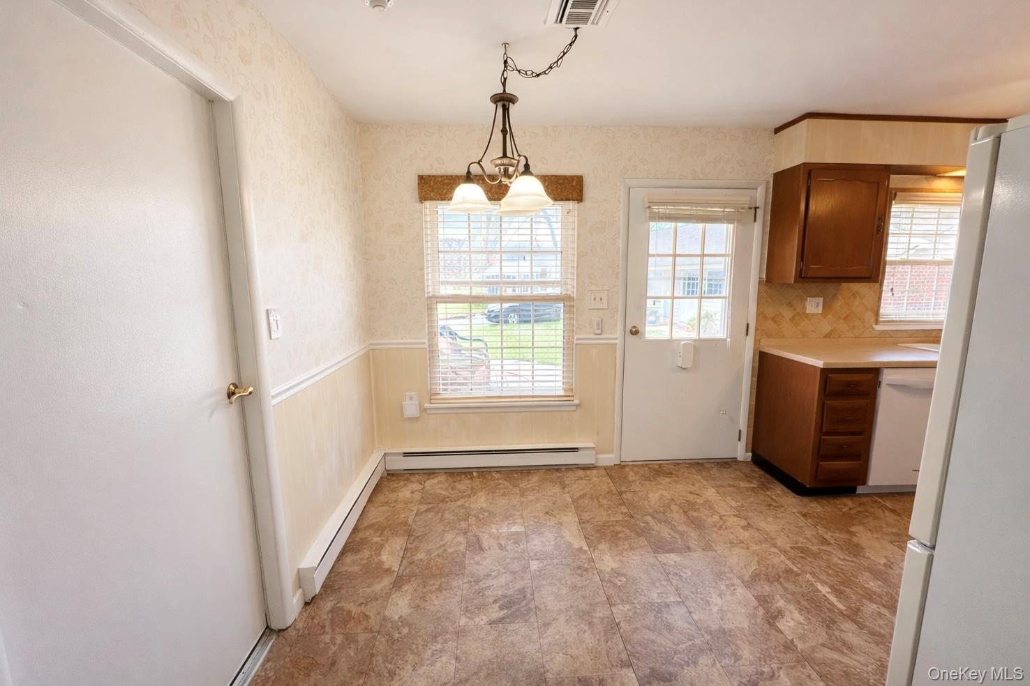9 Guilford Court, Unit B Ridge, NY 11961 - Photo 7 of 12 a view of an empty room with a window