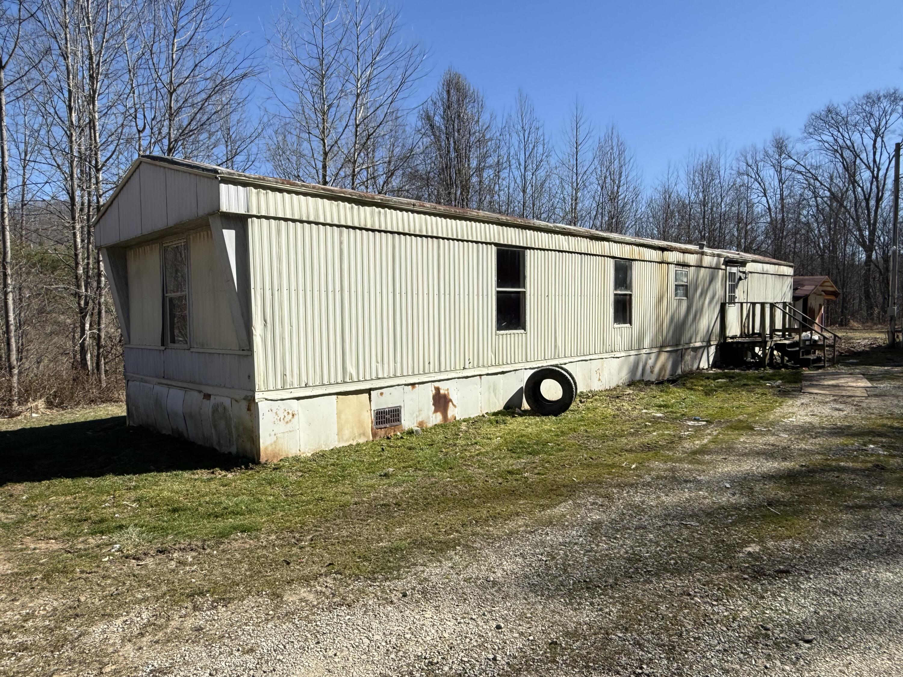 173 Freeman Cemetery Road Barbourville, KY 40906 - Photo 1 of 12 IMG_2836