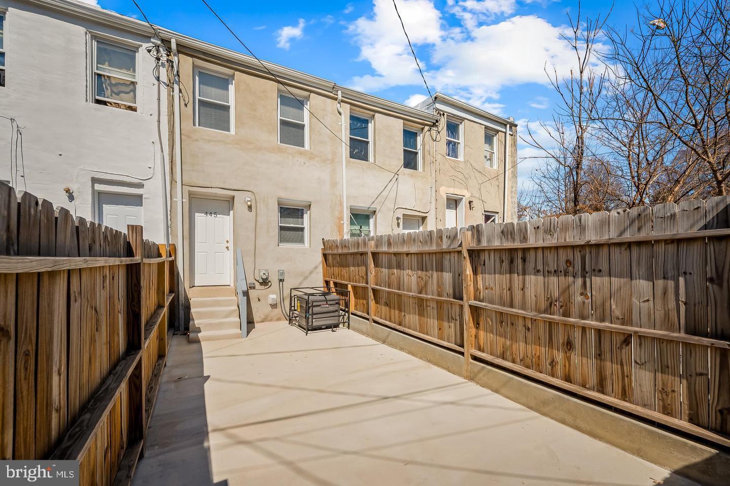 445 Pitman Place Baltimore, MD 21202 - Photo 25 of 29 a view of a house with iron fence