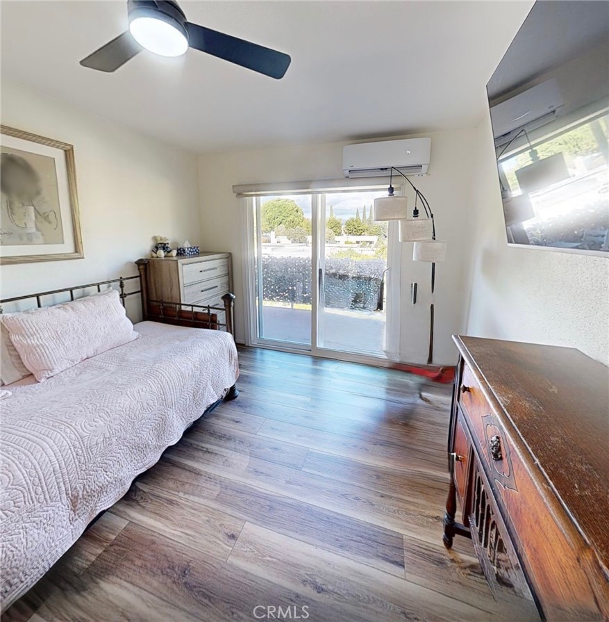 2143 Ronda Granada, Unit O Laguna Woods, CA 92637 - Photo 11 of 33 a bedroom with bed and window