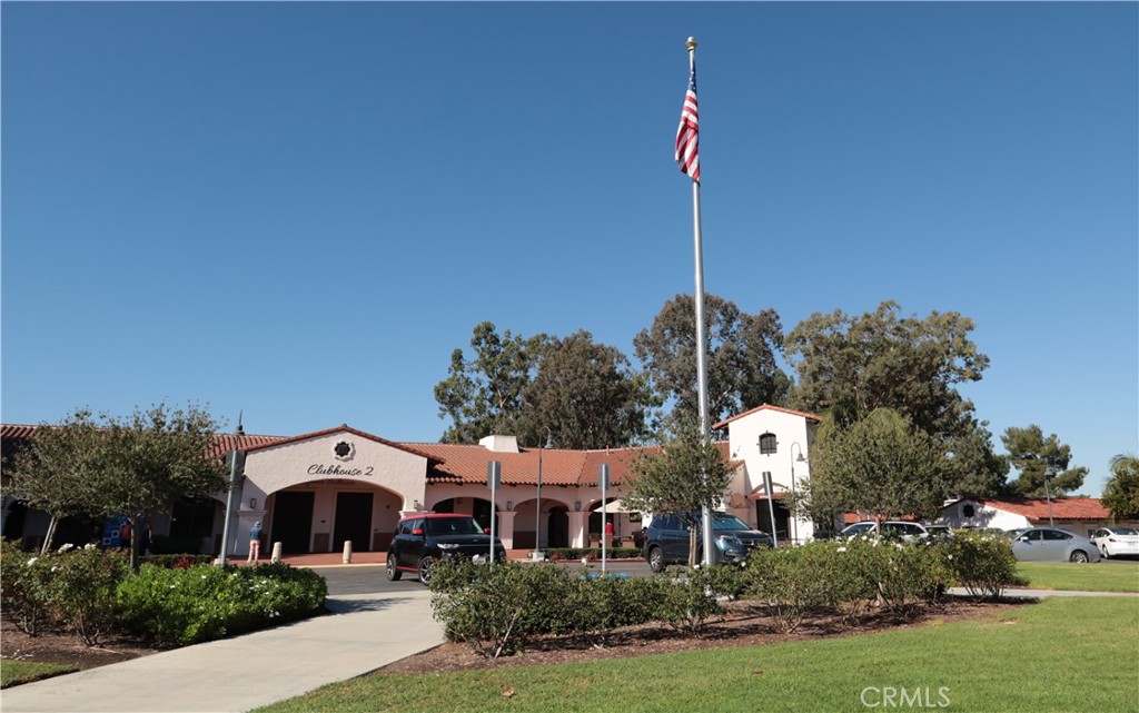 2143 Ronda Granada, Unit O Laguna Woods, CA 92637 - Photo 23 of 33 a front view of a house with garden