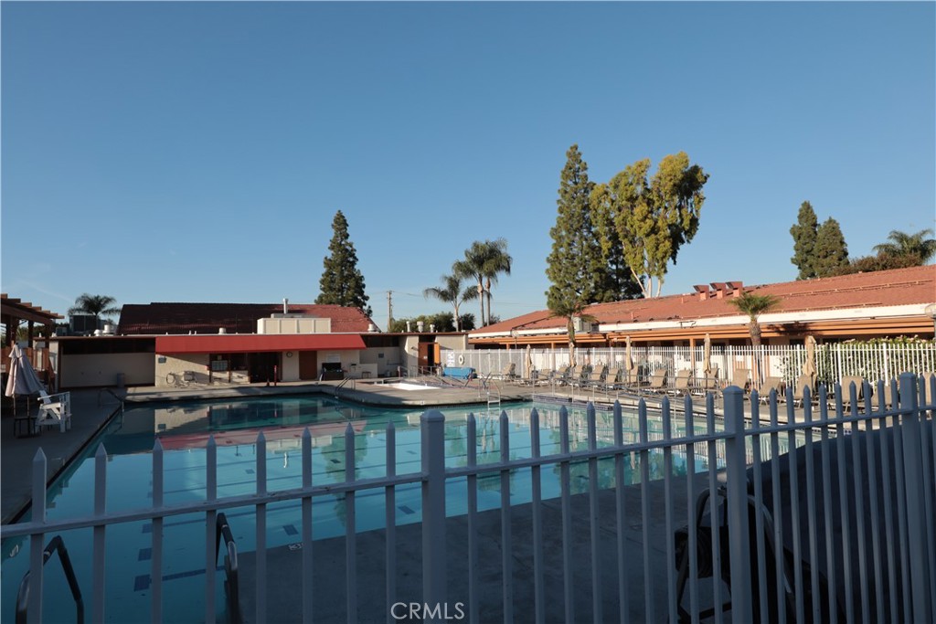 2143 Ronda Granada, Unit O Laguna Woods, CA 92637 - Photo 32 of 33 a view of houses and outdoor space