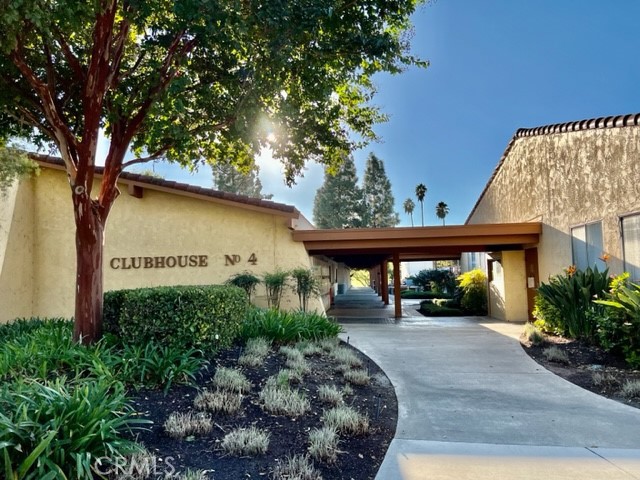 2143 Ronda Granada, Unit O Laguna Woods, CA 92637 - Photo 33 of 33 a view of house and garden with large trees