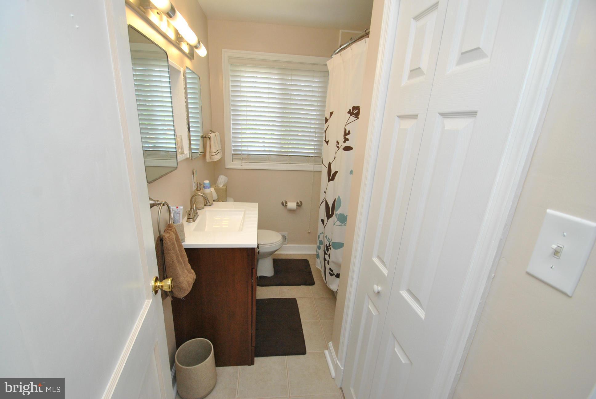 1355 Deanwood Road Baltimore, MD 21234 - Photo 20 of 24 UPPER LEVEL HALL FULL BATH