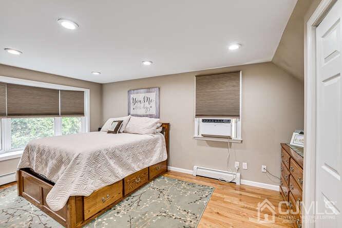 358 Old Post Road Edison, NJ 08817 - Photo 23 of 45 a bedroom with a large bed and a window