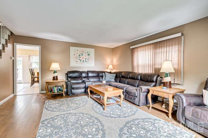 358 Old Post Road Edison, NJ 08817 - Photo 8 of 45 a living room with furniture large window and a table