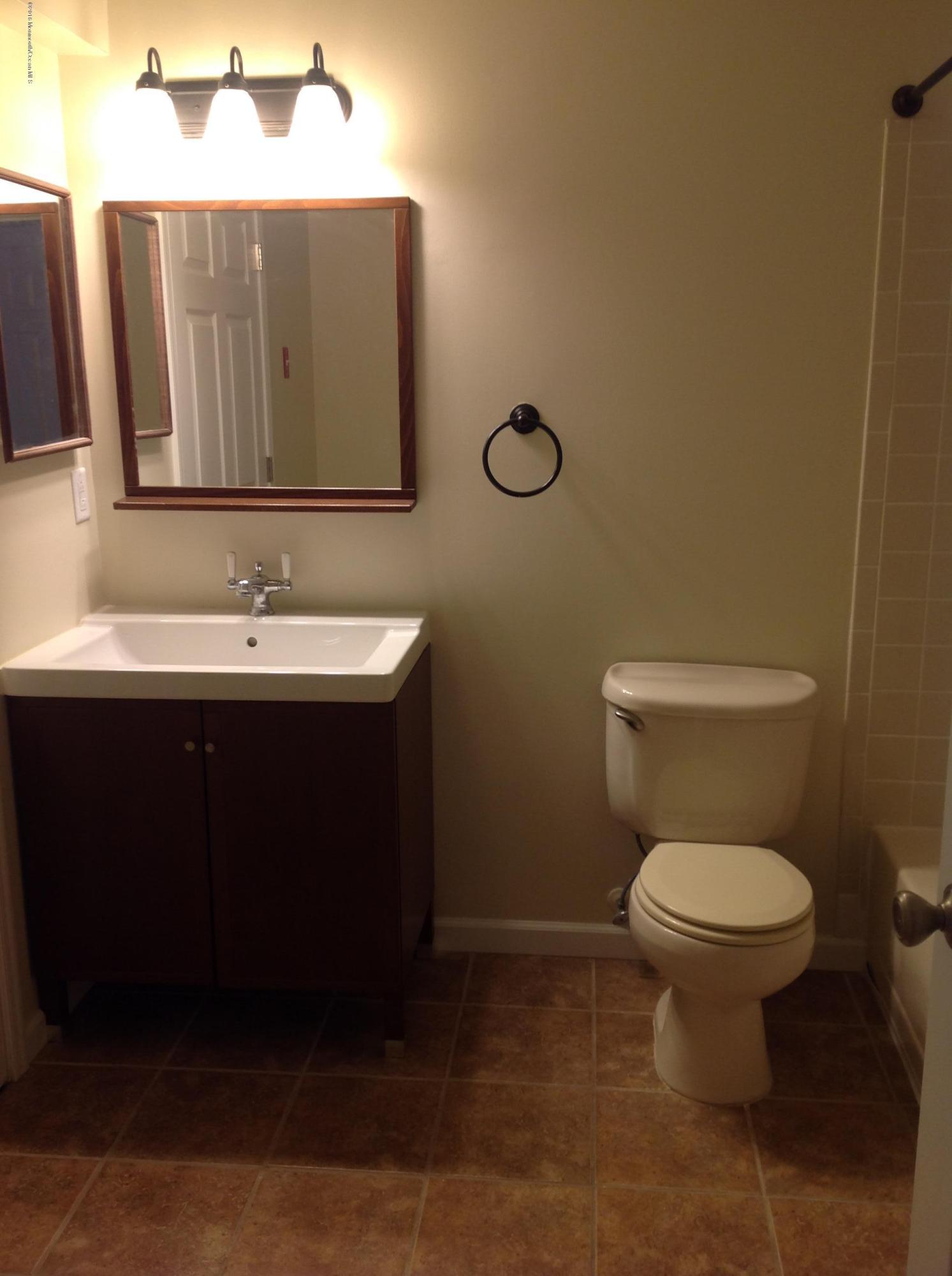 71 Azalea Circle Jackson, NJ 08527 - Photo 12 of 18 a bathroom with a sink and a toilet