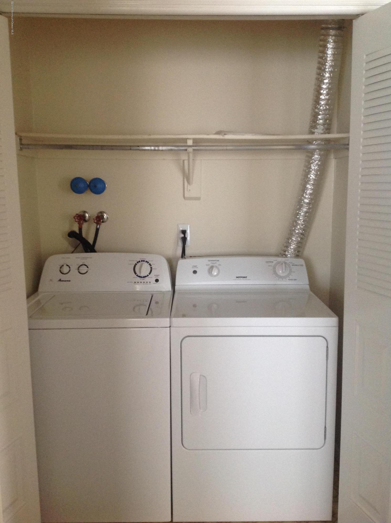 71 Azalea Circle Jackson, NJ 08527 - Photo 13 of 18 a utility room with dryer and washer
