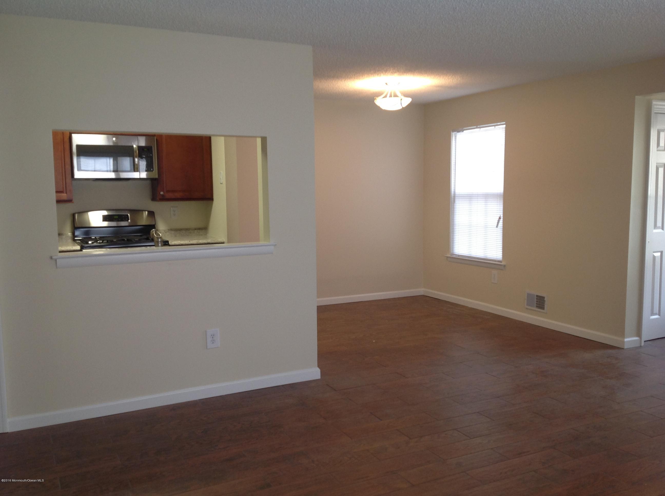 71 Azalea Circle Jackson, NJ 08527 - Photo 15 of 18 a view of an empty room with a window