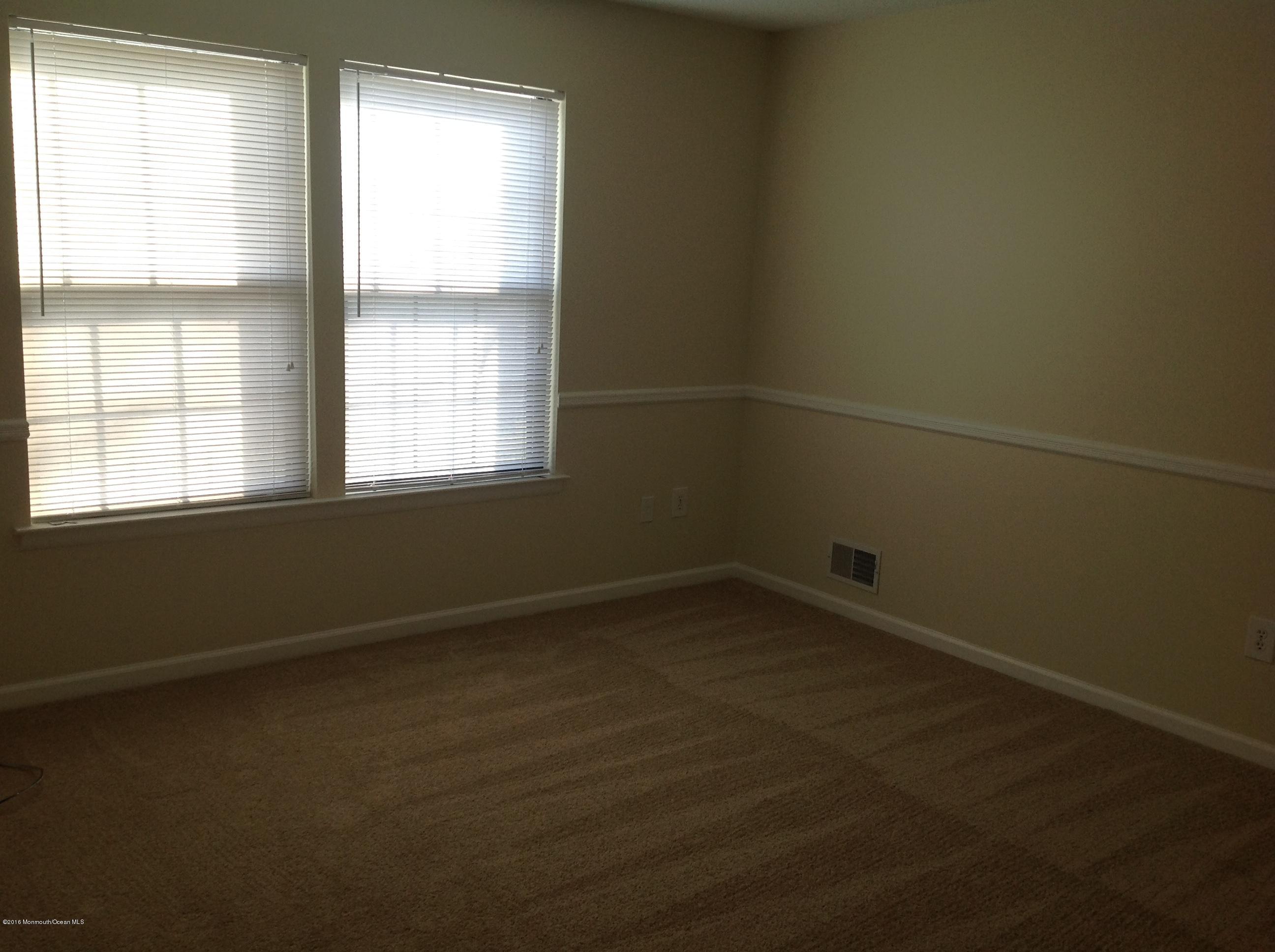 71 Azalea Circle Jackson, NJ 08527 - Photo 7 of 18 an empty room with a window