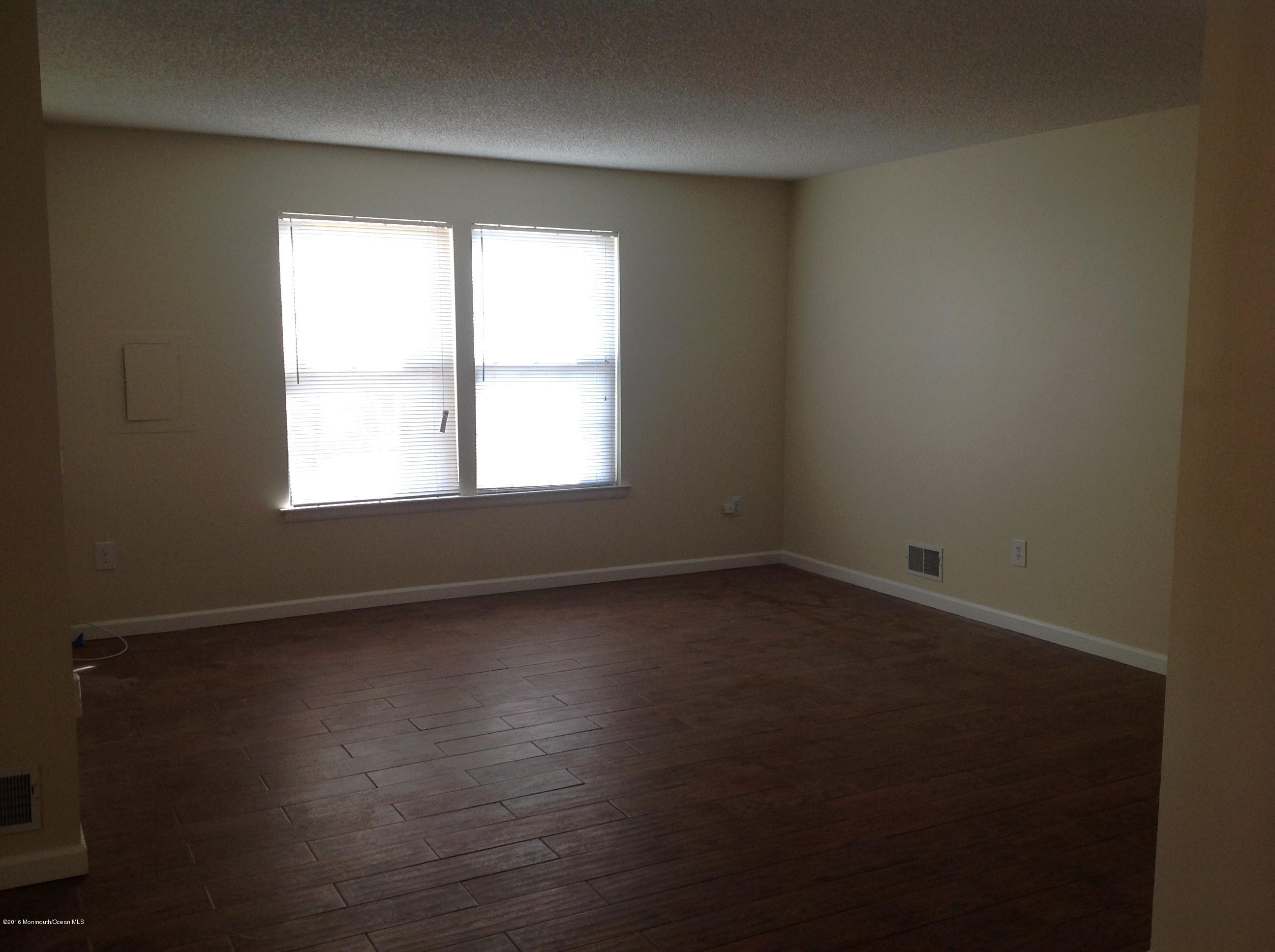 71 Azalea Circle Jackson, NJ 08527 - Photo 8 of 18 an empty room with a window