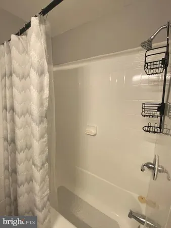 a bathroom with a toilet and a sink