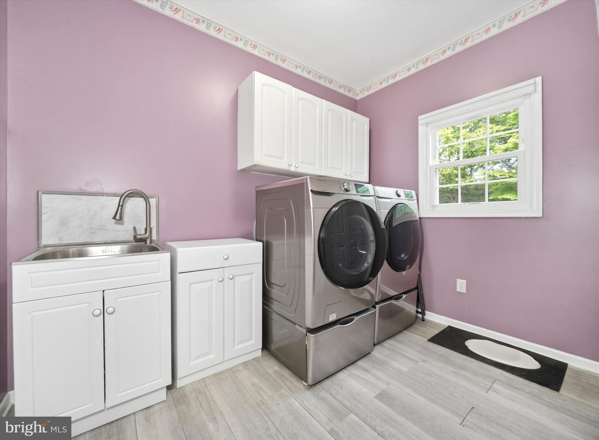 100 Cambridge Road Landenberg, PA 19350 - Photo 15 of 37 a utility room with dryer and washer