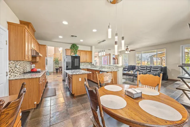 a view of a hallway with stairs