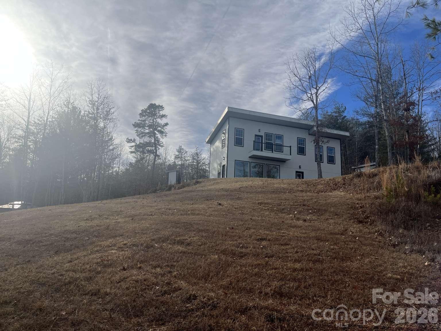 3445 Irish Hills Road Morganton, NC 28655 - Photo 31 of 34 a view of a house with a yard