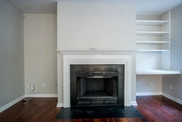 a living room with a fireplace