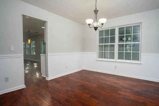 a view of livingroom with hardwood floor and window
