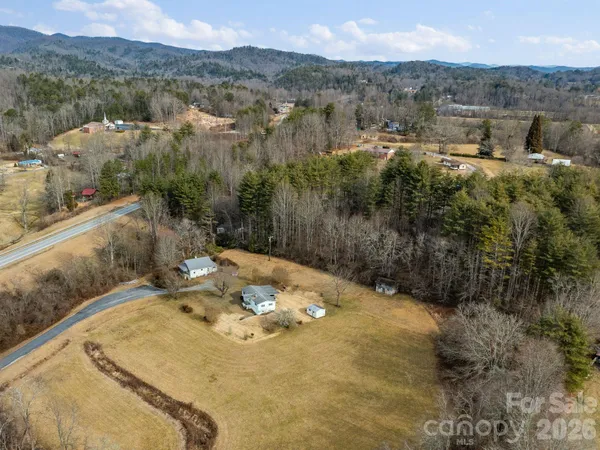 a view of a backyard with mountain view