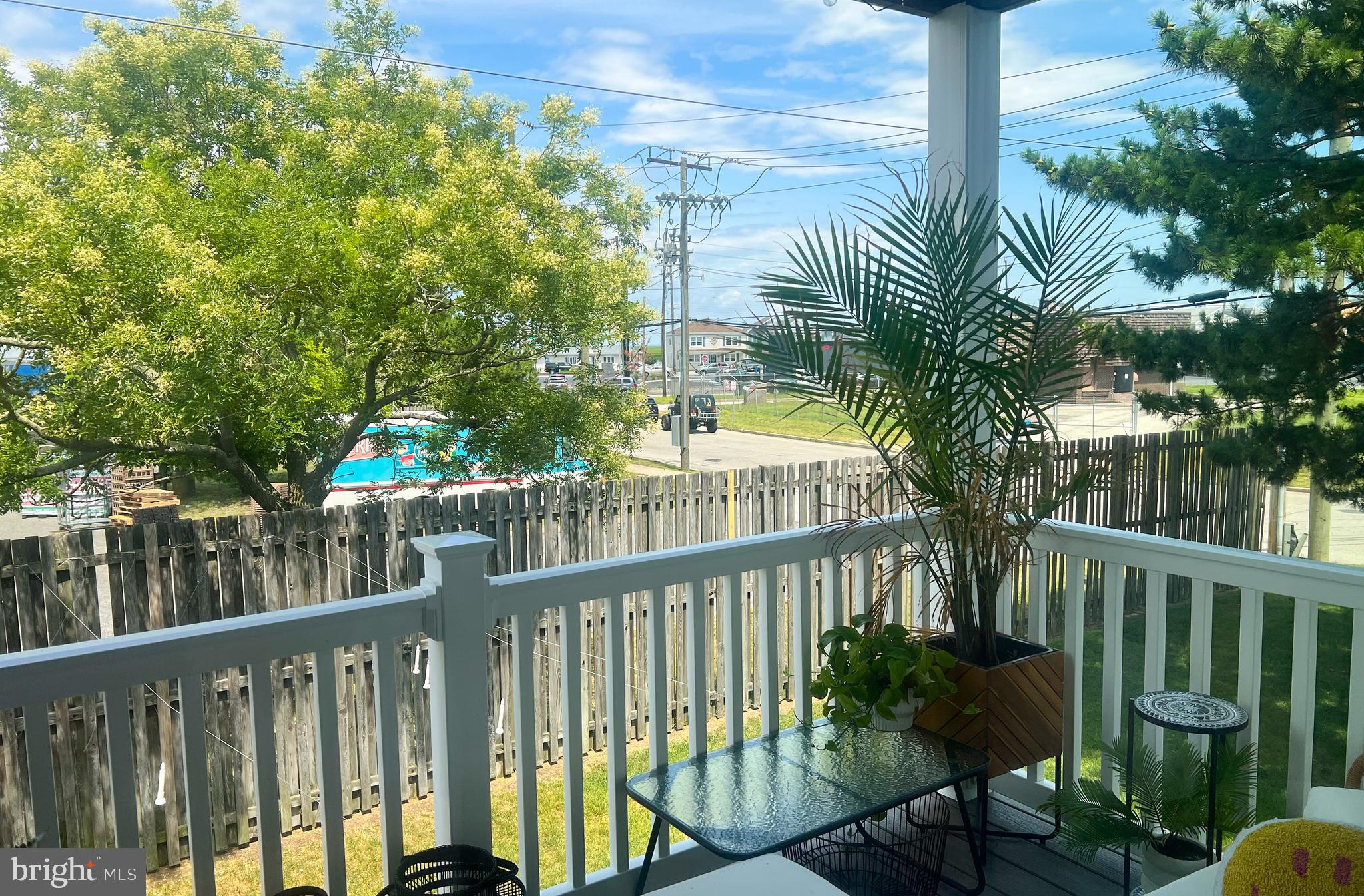 155 39th Street South Brigantine, NJ 08203 - Photo 14 of 17 a view of a street with wooden fence