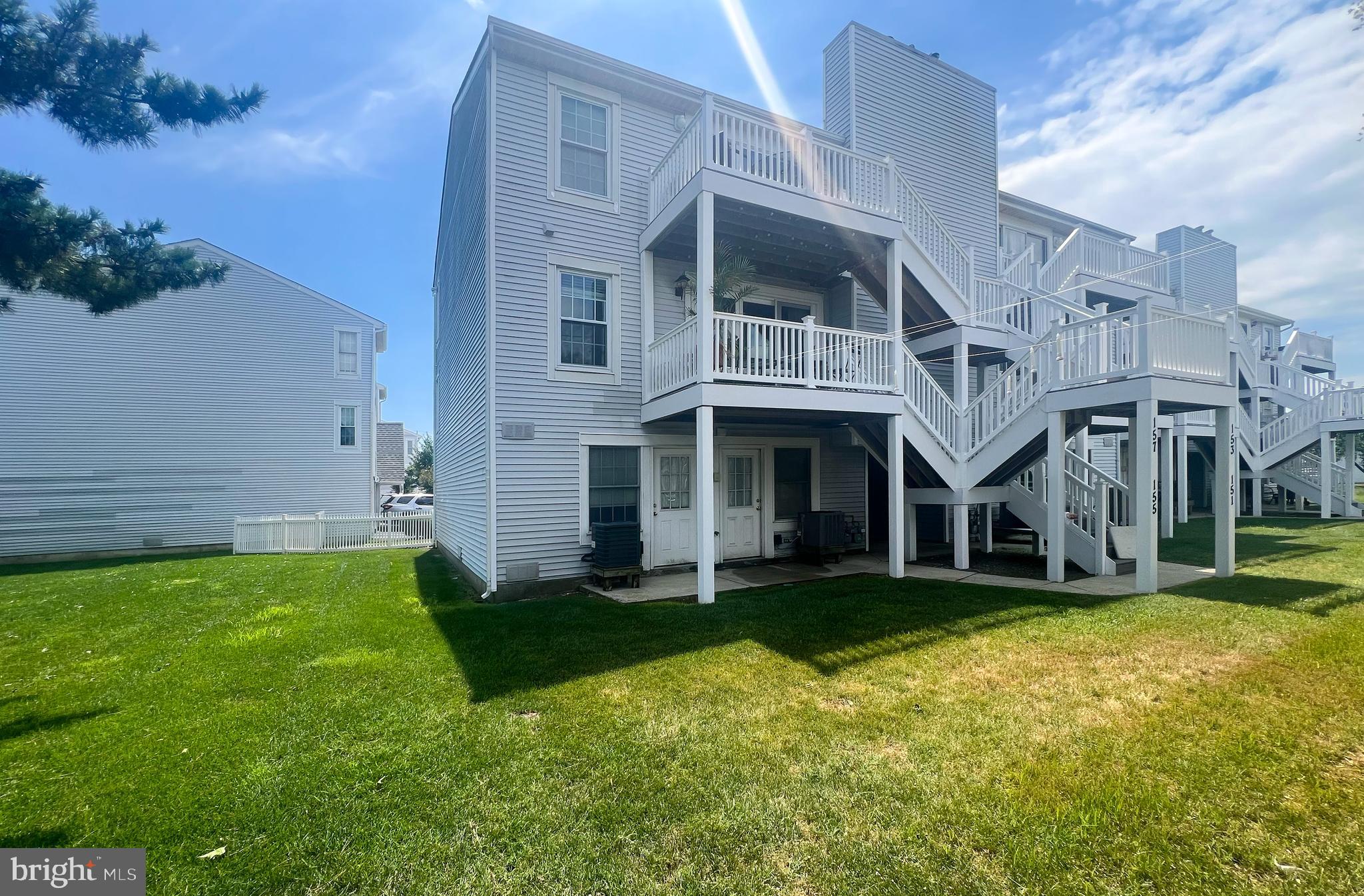 155 39th Street South Brigantine, NJ 08203 - Photo 16 of 17 a view of a big room with a big yard and large trees