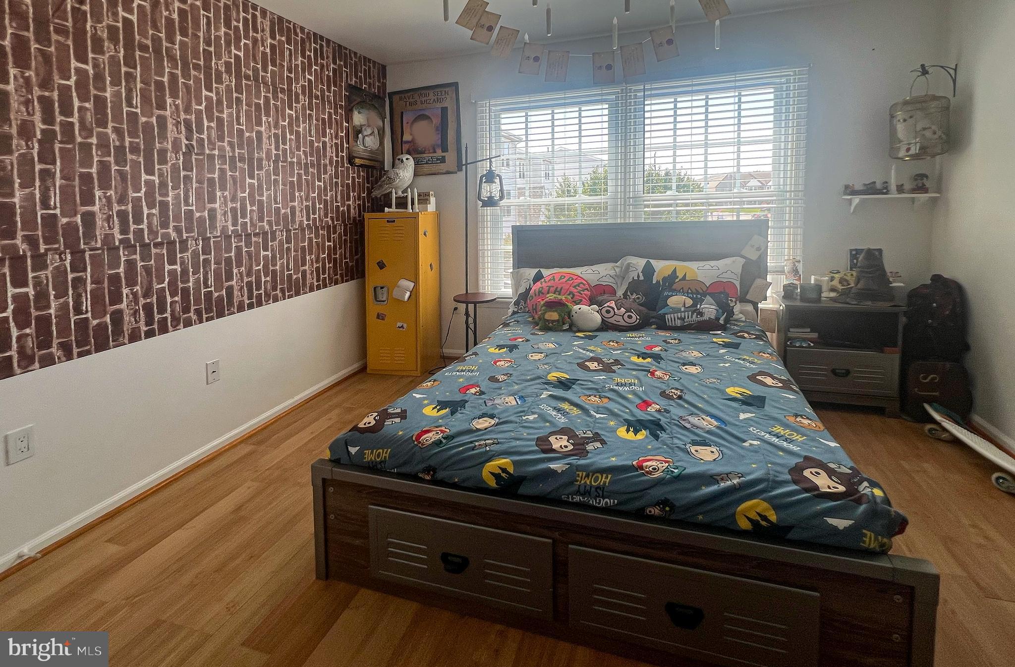 155 39th Street South Brigantine, NJ 08203 - Photo 10 of 17 a bed sitting in a bedroom next to a window