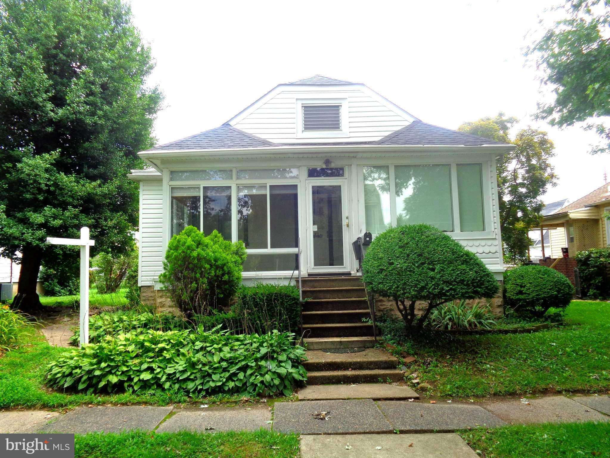 47 Broadship Road Baltimore, MD 21222 - Photo 1 of 27 a front view of a house with a yard