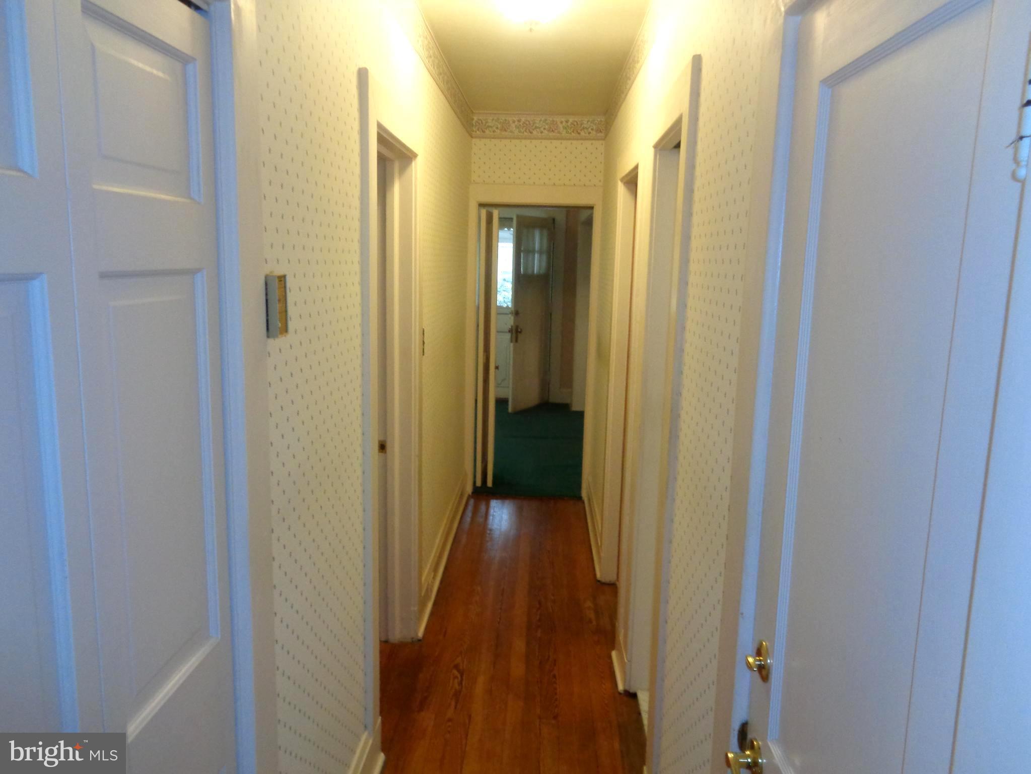 47 Broadship Road Baltimore, MD 21222 - Photo 12 of 27 a view of a hallway with wooden floor