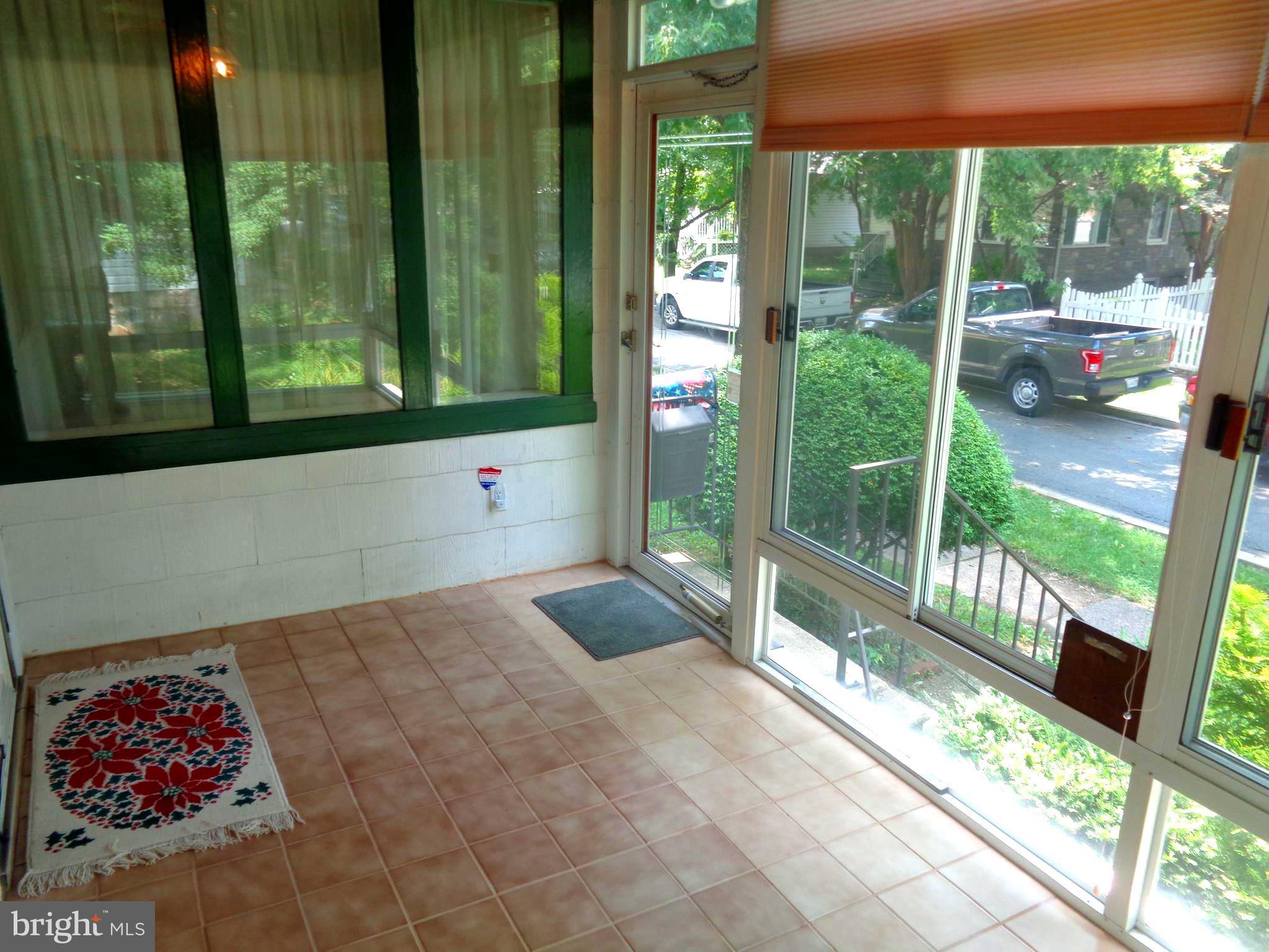 47 Broadship Road Baltimore, MD 21222 - Photo 3 of 27 a living room with yard and outdoor space