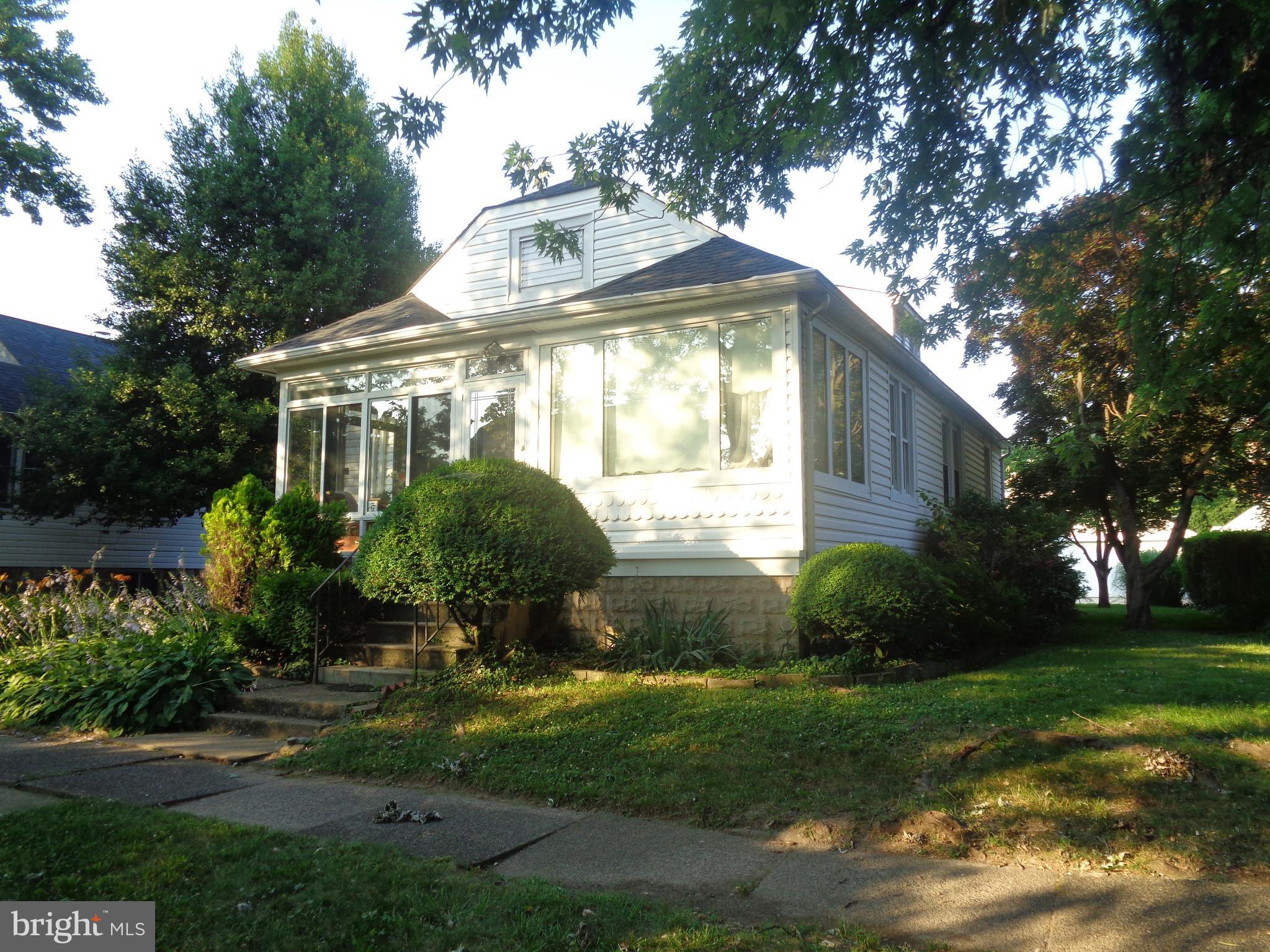 47 Broadship Road Baltimore, MD 21222 - Photo 24 of 27 a front view of a house with garden