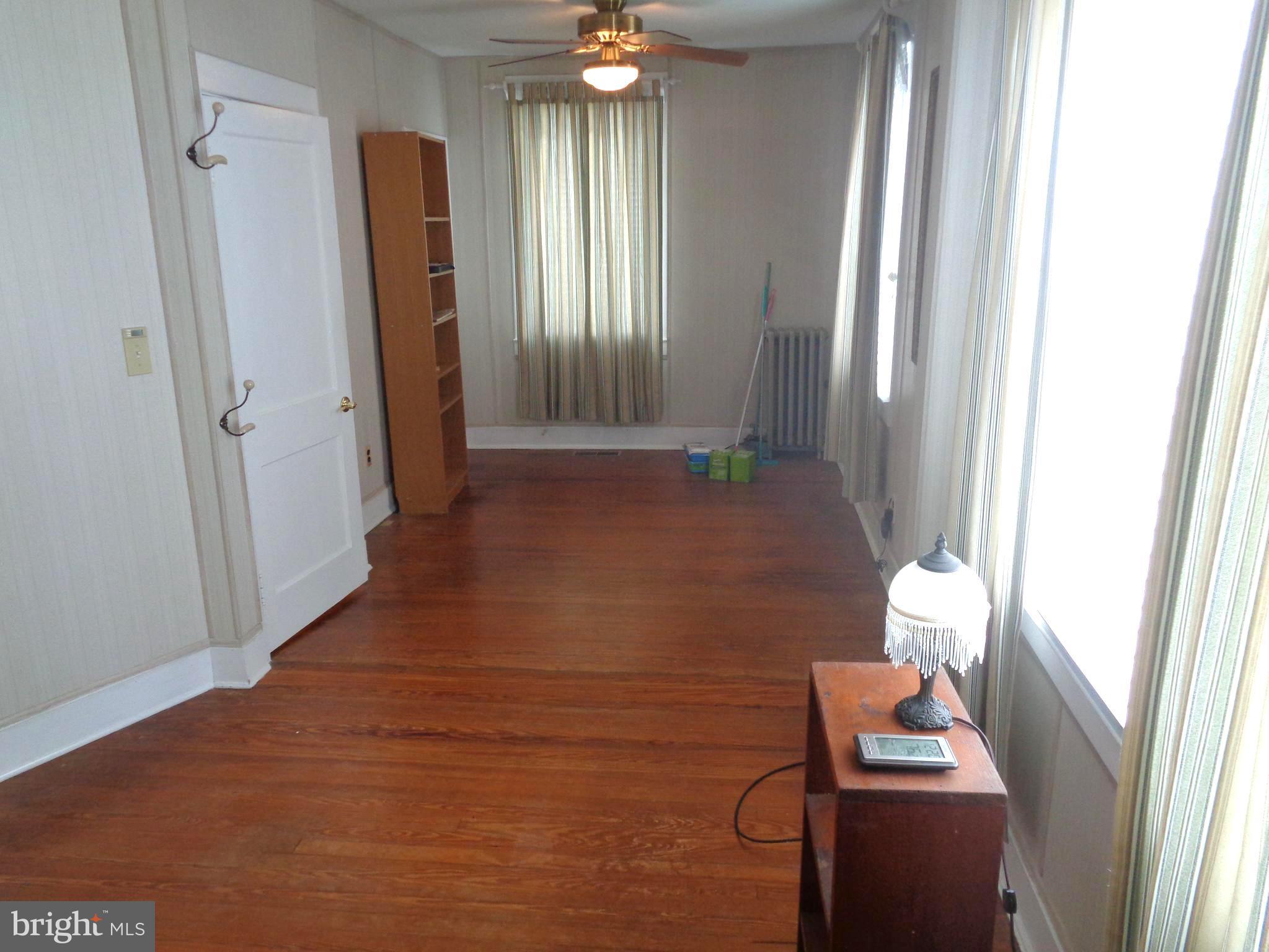 47 Broadship Road Baltimore, MD 21222 - Photo 8 of 27 a view of an empty room with a window