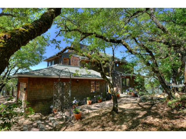 18554 Favre Ridge Road Los Gatos, CA 95033 - Photo 1 of 21 a backyard of a house with lots of green space