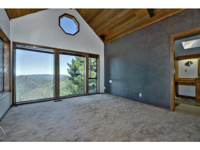 18554 Favre Ridge Road Los Gatos, CA 95033 - Photo 12 of 21 a view of an empty room with a window