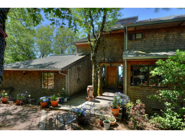 18554 Favre Ridge Road Los Gatos, CA 95033 - Photo 3 of 21 a view of a house with backyard