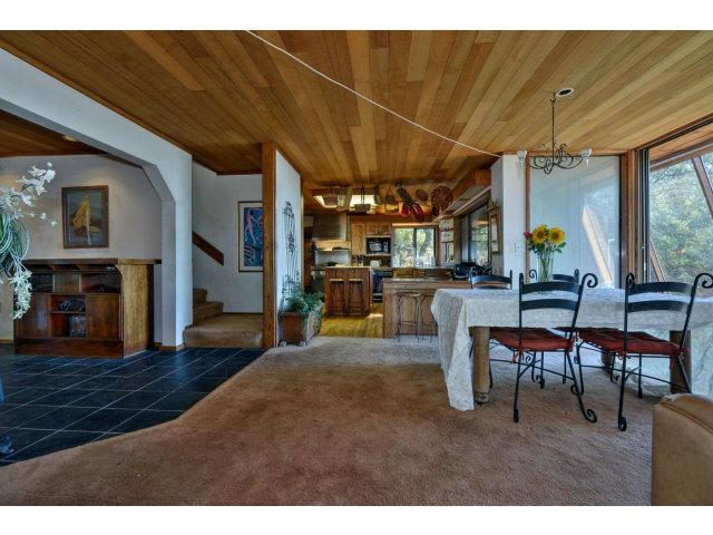 18554 Favre Ridge Road Los Gatos, CA 95033 - Photo 8 of 21 a view of a chairs and table in a patio