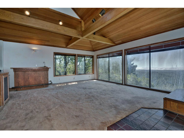 18554 Favre Ridge Road Los Gatos, CA 95033 - Photo 10 of 21 a view of an empty room with a window